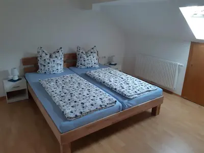 Ein Bett oder Betten in einem Zimmer der Unterkunft Ferienwohnung Gmeiner