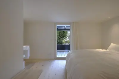 Ein Bett oder Betten in einem Zimmer der Unterkunft BAR10ZIMMER