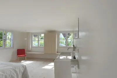Ein Bett oder Betten in einem Zimmer der Unterkunft BAR10ZIMMER