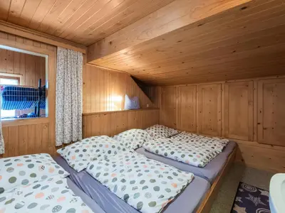 Ein Bett oder Betten in einem Zimmer der Unterkunft Chalet in Schwarzenberg am Skilift