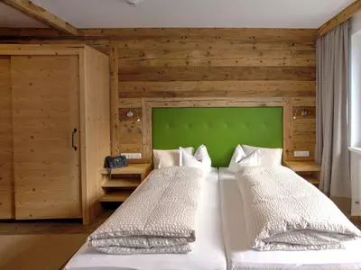 Ein Bett oder Betten in einem Zimmer der Unterkunft Pension Muggengrat