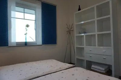 Ein Bett oder Betten in einem Zimmer der Unterkunft Ferienwohnung Bergblick