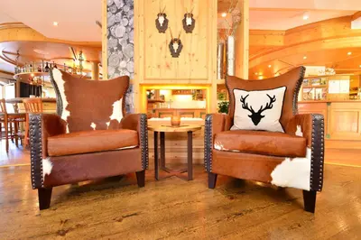 Ein Sitzbereich in der Unterkunft Hotel Jagdhof