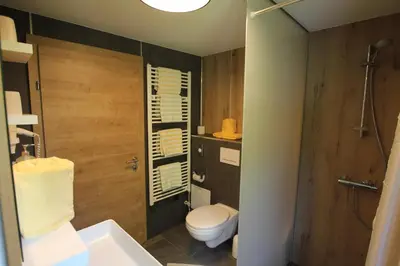 Ein Badezimmer in der Unterkunft Hotel Maroi