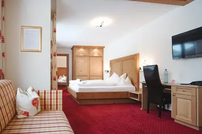Ein Bett oder Betten in einem Zimmer der Unterkunft Hotel Acerina Superior