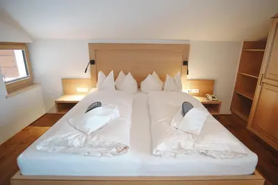 Ein Bett oder Betten in einem Zimmer der Unterkunft Hotel Acerina Superior