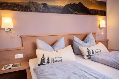 Ein Bett oder Betten in einem Zimmer der Unterkunft Im Höfle Ferienwohnungen