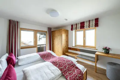 Ein Bett oder Betten in einem Zimmer der Unterkunft Haus Tannberg