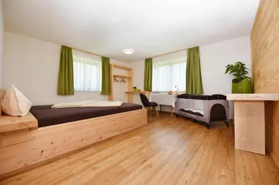 Ein Bett oder Betten in einem Zimmer der Unterkunft Mottnerhof