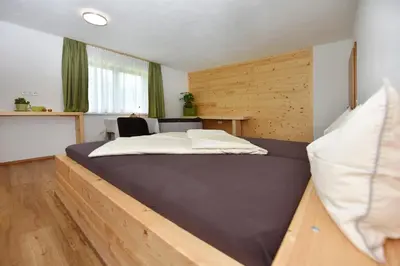 Ein Bett oder Betten in einem Zimmer der Unterkunft Mottnerhof