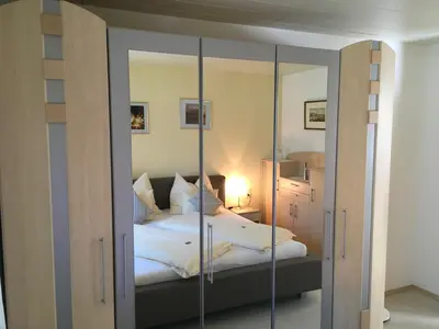 Ein Bett oder Betten in einem Zimmer der Unterkunft Ferienwohnung Karin