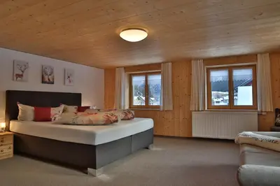 Ein Bett oder Betten in einem Zimmer der Unterkunft Apartments Hänsler