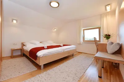 Ein Bett oder Betten in einem Zimmer der Unterkunft Hof Lässer