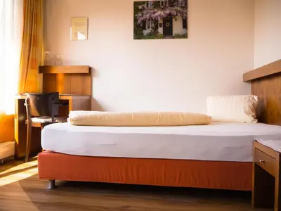 Ein Bett oder Betten in einem Zimmer der Unterkunft Gasthof Meindl - Self-Check-In mit 24h Telefon Support