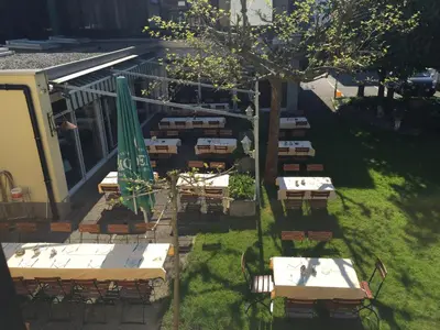 Ein Garten an der Unterkunft Gasthof Meindl - Self-Check-In mit 24h Telefon Support