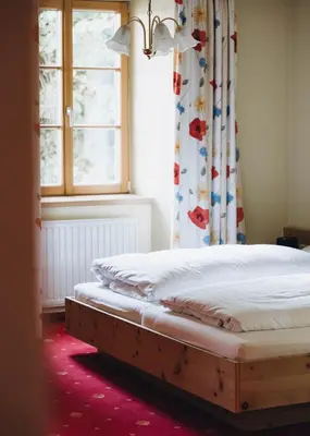 Ein Bett oder Betten in einem Zimmer der Unterkunft Gasthof Post