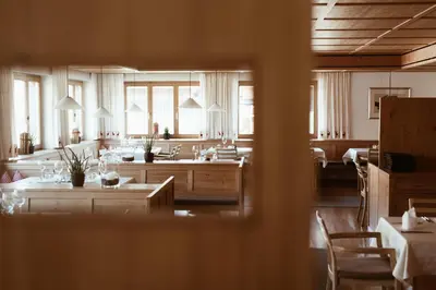 Ein Sitzbereich in der Unterkunft Aparthotel Hubertus Mellau