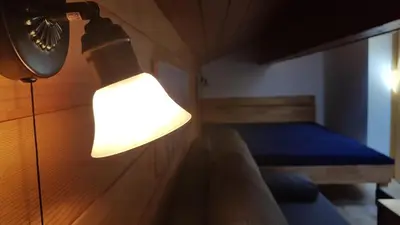 Ein Bett oder Betten in einem Zimmer der Unterkunft Ferienwohnung Apres Ski