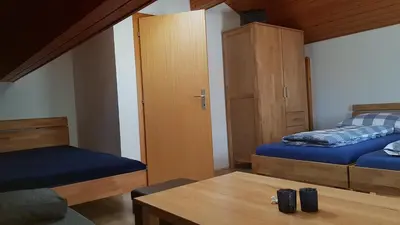 Ein Bett oder Betten in einem Zimmer der Unterkunft Ferienwohnung Apres Ski