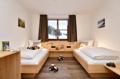 Ein Bett oder Betten in einem Zimmer der Unterkunft Ferienhof Sonne