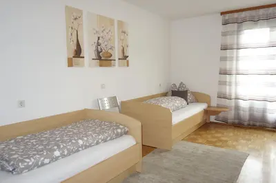 Ein Bett oder Betten in einem Zimmer der Unterkunft Wirtshaus zum Stern