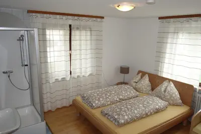 Ein Bett oder Betten in einem Zimmer der Unterkunft Wirtshaus zum Stern