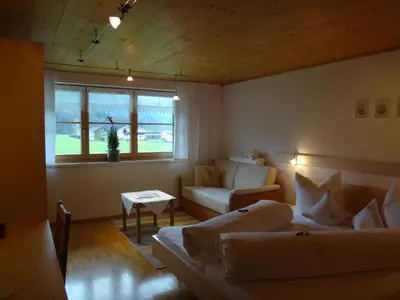 Ein Sitzbereich in der Unterkunft Gästehaus Appartements Egender