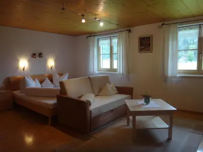 Ein Sitzbereich in der Unterkunft Gästehaus Appartements Egender