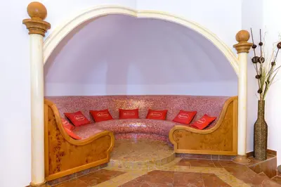 Ein Sitzbereich in der Unterkunft Hotel Leitner