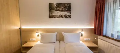 Ein Bett oder Betten in einem Zimmer der Unterkunft Gästehaus-Pension Barbara
