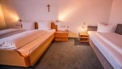 Ein Bett oder Betten in einem Zimmer der Unterkunft Gästehaus-Pension Barbara