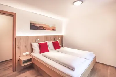 Ein Bett oder Betten in einem Zimmer der Unterkunft Haus Rothorn