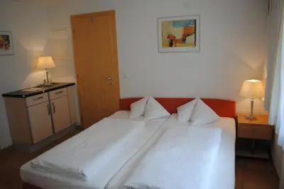 Ein Bett oder Betten in einem Zimmer der Unterkunft Appart Saroja-Tannleger