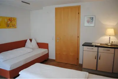 Ein Bett oder Betten in einem Zimmer der Unterkunft Appart Saroja-Tannleger