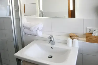 Ein Badezimmer in der Unterkunft Hotel Alpensonne