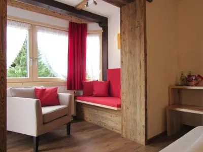 Ein Sitzbereich in der Unterkunft Hotel Alpensonne