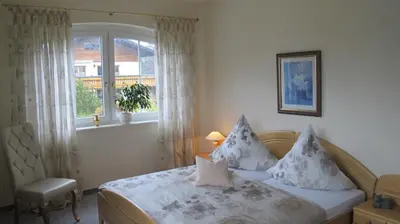 Ein Bett oder Betten in einem Zimmer der Unterkunft Alpentraum
