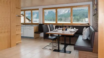 Ein Sitzbereich in der Unterkunft Appartements Madlener