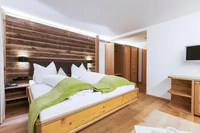 Ein Bett oder Betten in einem Zimmer der Unterkunft Gästehaus Mathies