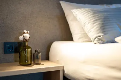 Ein Bett oder Betten in einem Zimmer der Unterkunft Gästehaus Strasser