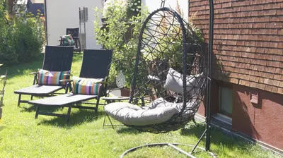 Ein Garten an der Unterkunft Pension Hartenfels