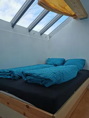 Ein Bett oder Betten in einem Zimmer der Unterkunft Apartment Bergführer