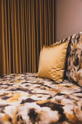 Ein Bett oder Betten in einem Zimmer der Unterkunft Hotel Gasthof KREUZ