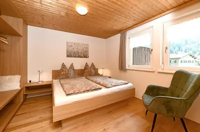 Ein Bett oder Betten in einem Zimmer der Unterkunft Ferienwohnungen Schantl