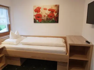 Ein Bett oder Betten in einem Zimmer der Unterkunft Haus Jehle