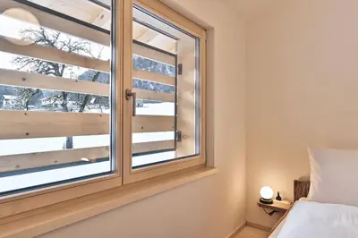 Ein Bett oder Betten in einem Zimmer der Unterkunft Wald 12 Ferienhaus