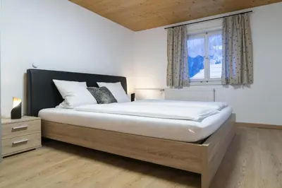Ein Bett oder Betten in einem Zimmer der Unterkunft Bergwelt-M
