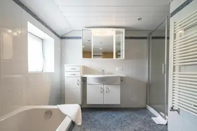 Ein Badezimmer in der Unterkunft Bergwelt-M