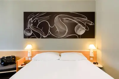 Ein Bett oder Betten in einem Zimmer der Unterkunft Hotel Ibis Bregenz