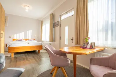 Ein Bett oder Betten in einem Zimmer der Unterkunft Haus Christina - Romantik Suite